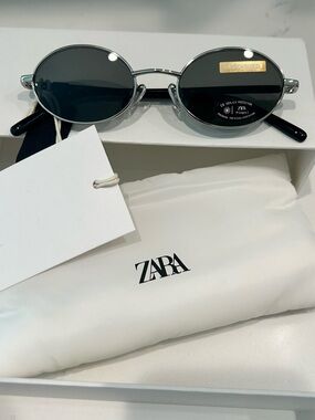 Zara oval metal sunglasses in silver with polarized lenses. With Case. NWT